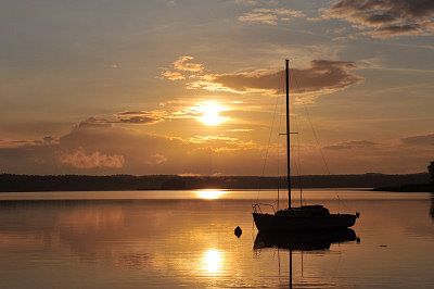 Sunset pictures - lake and sailboat