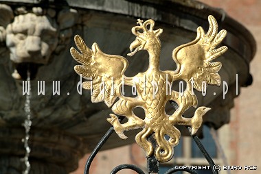Golden eagle. Neptun fountain in Gdansk, Poland